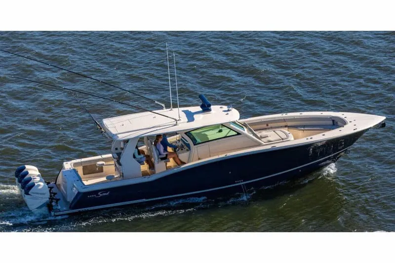 The Image of Manufacturer Provided Image: 2025 Scout 425 LXF boat cruising on open water, side view. - 0