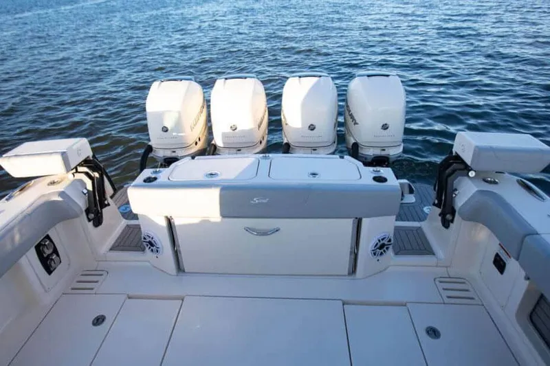 Slide: The Image of Manufacturer Provided Image: 2025 Scout 425 LXF boat with five powerful outboard engines on the water. - 11