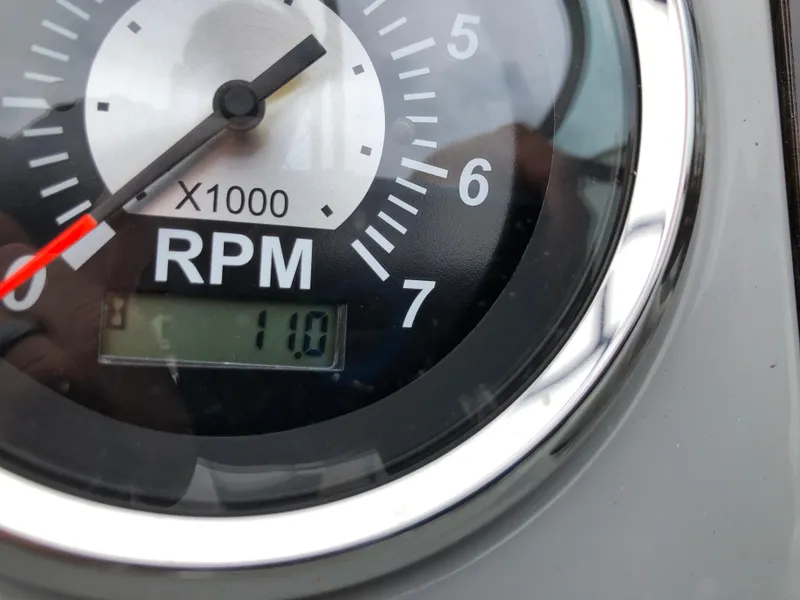 Slide: The Image of Close-up of Chaparral 23 SSi 2021 RPM gauge showing 1,100 RPM. - 11