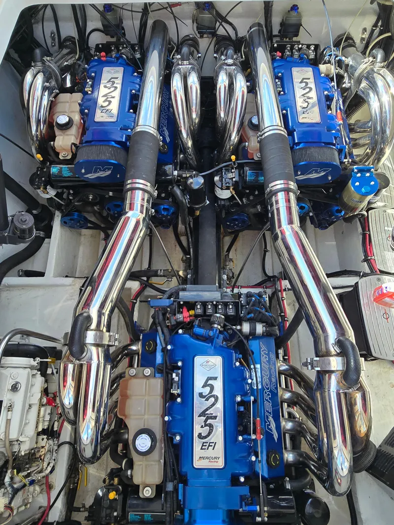 Slide: The Image of Twin Mercury 525 EFI engines in a 2004 Fountain 47 Lightning boat. - 8