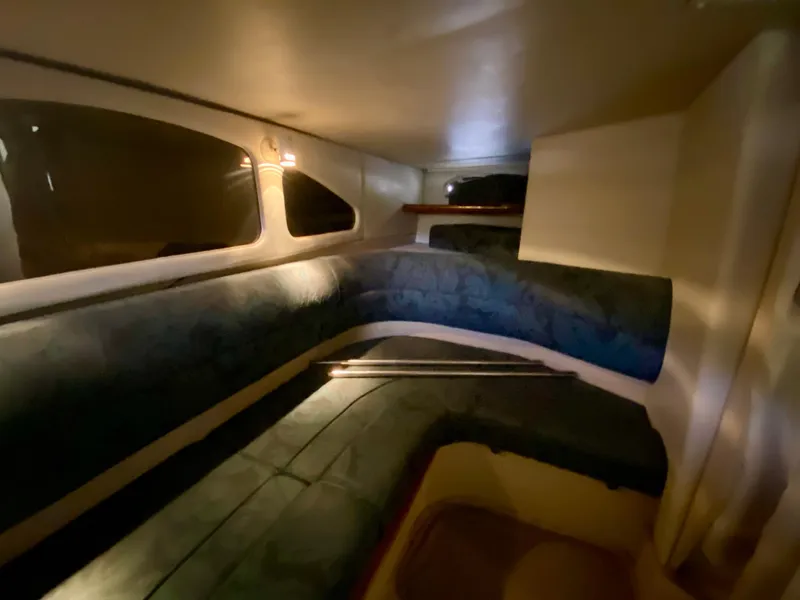 Slide: The Image of 1999 Cruisers Yachts 3375 Esprit interior with cozy seating and ambient lighting. - 27