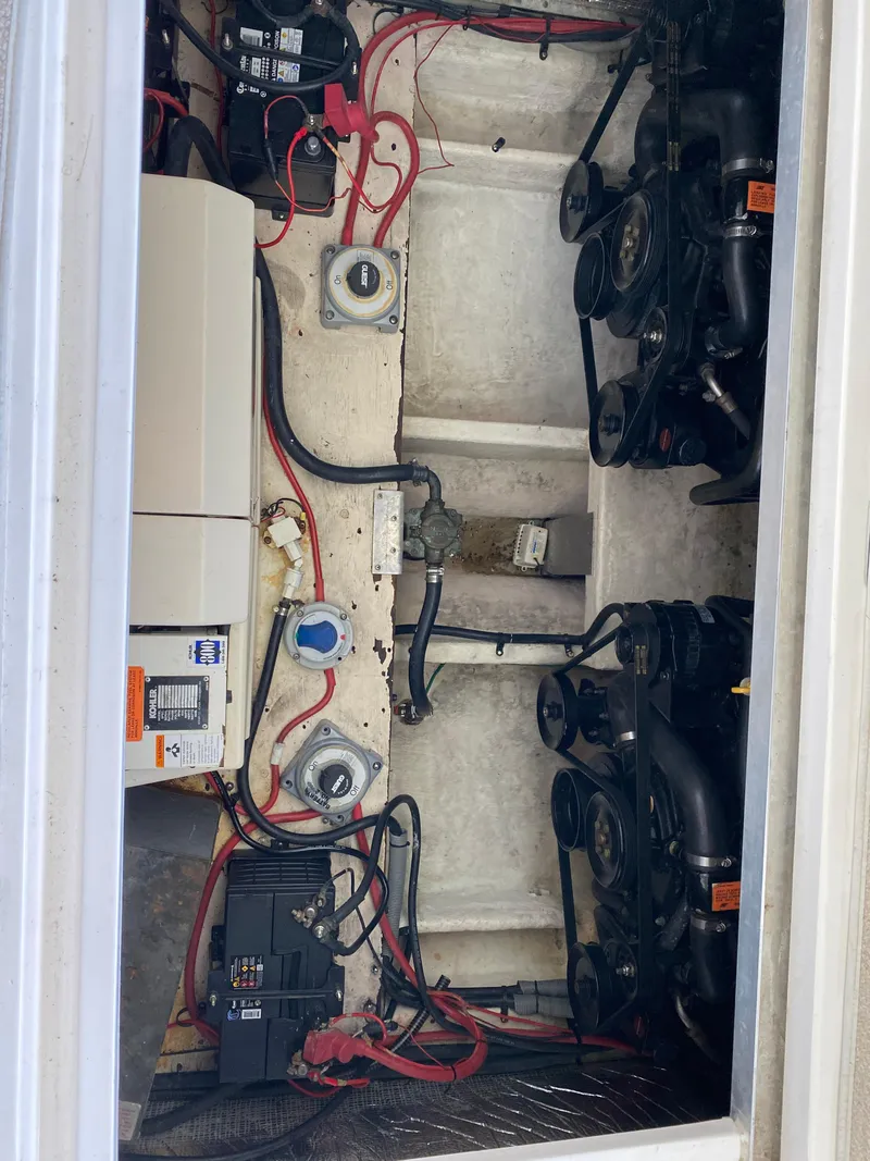 Slide: The Image of Engine compartment of a 1999 Cruisers Yachts 3375 Esprit with visible wiring and components. - 32