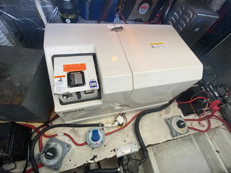 Slide: The Image of Engine room of 1999 Cruisers Yachts 3375 Esprit with Kohler power system. - 37