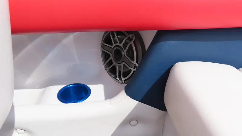 Slide: The Image of Interior of 2000 Donzi 28ZX boat with speaker and cup holder. - 19