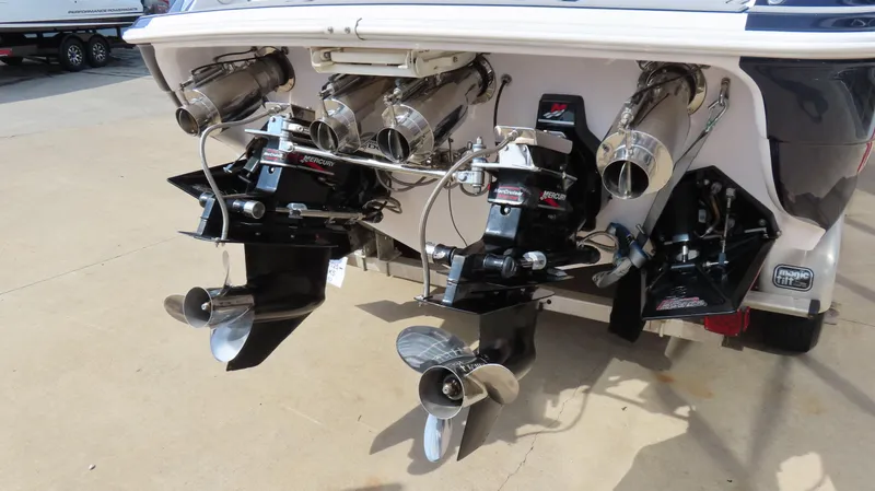 Slide: The Image of 2000 Donzi 28ZX boat with dual Mercury outboard engines and stainless steel propellers. - 7