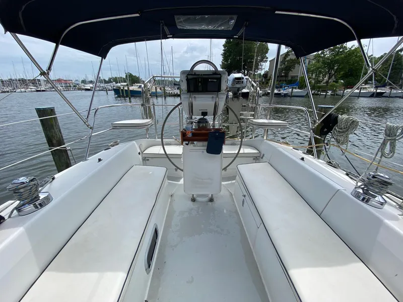 Slide: The Image of Cockpit of a 1995 Catalina 36 MkII sailboat docked at a marina. - 15