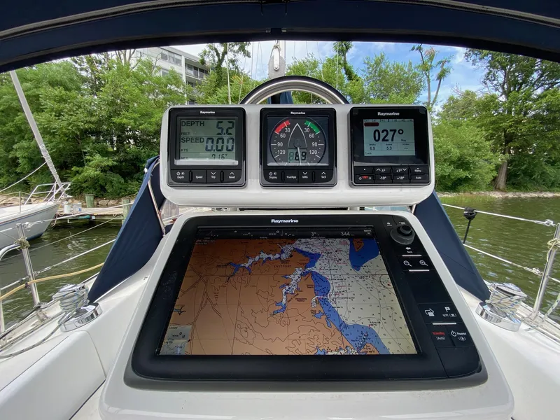 Slide: The Image of Cockpit of 1995 Catalina 36 MkII sailboat with navigation instruments and chart display. - 17