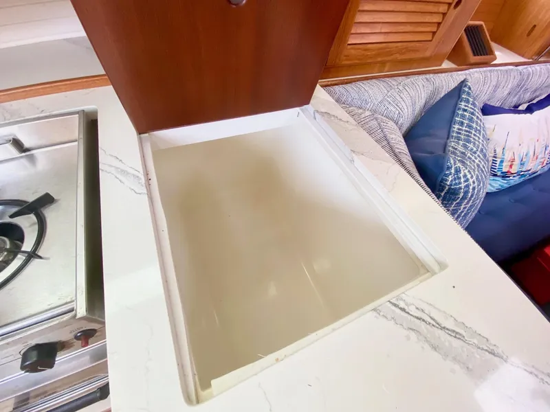 Slide: The Image of Galley sink and stove in 1995 Catalina 36 MkII yacht interior. - 39