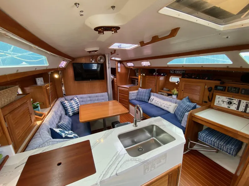Slide: The Image of Interior of 1995 Catalina 36 MkII sailboat with cozy seating and modern amenities. - 40