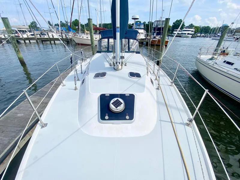 Slide: The Image of Sailboat Catalina 36 MkII 1995 docked at marina, view of deck and rigging. - 8