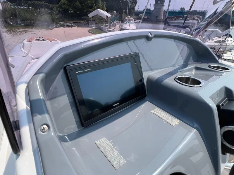 Slide: The Image of Control panel of 2019 Grand G580HLF boat with Garmin GPS display. - 10