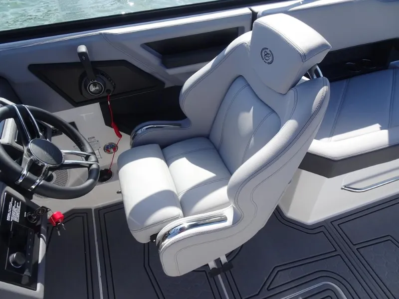 Slide: The Image of Luxury interior of 2025 Cobalt R8 Surf boat with plush seating and modern controls. - 12