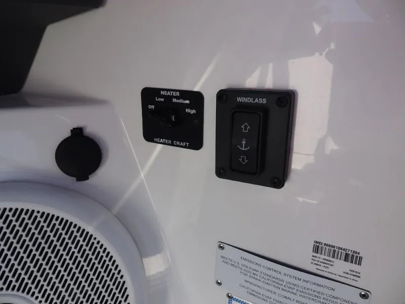 Slide: The Image of Control panel on 2025 Cobalt R8 Surf boat with heater and windlass switches. - 15
