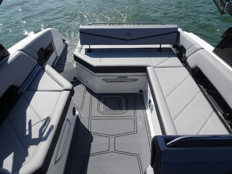 Slide: The Image of Luxurious interior of 2025 Cobalt R8 Surf boat with sleek seating and modern design. - 25