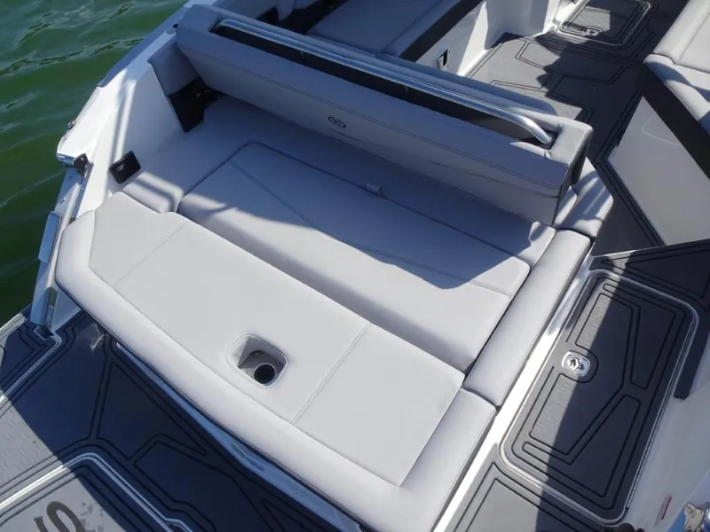 Slide: The Image of 2025 Cobalt R8 Surf boat interior with sleek seating and modern design. - 8