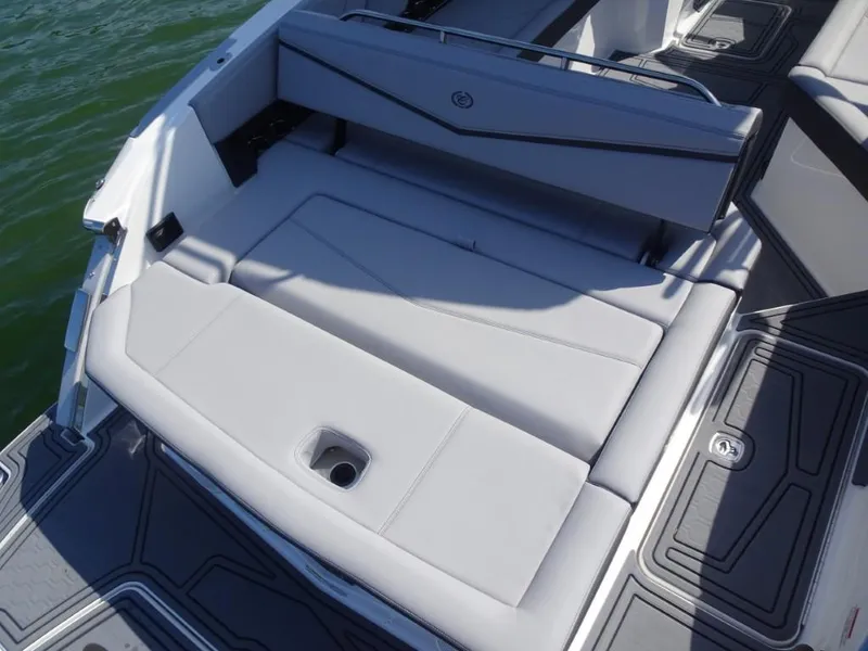 Slide: The Image of 2025 Cobalt R8 Surf boat interior with sleek seating and modern design. - 9