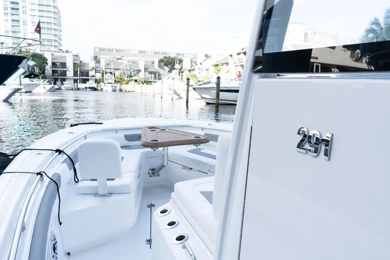 Slide: The Image of 2025 Caymas 291 HB boat docked, featuring sleek design and modern amenities. - 25