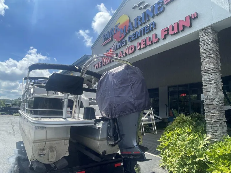 Slide: The Image of 2023 G3 SunCatcher Elite 324 SS boat at Park Marine Center, sunny day. - 4