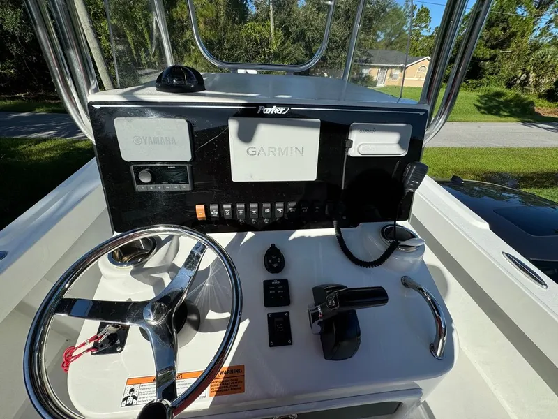 Slide: The Image of Control panel of 2022 Parker 2300 Special Edition boat with Garmin and Yamaha systems. - 10
