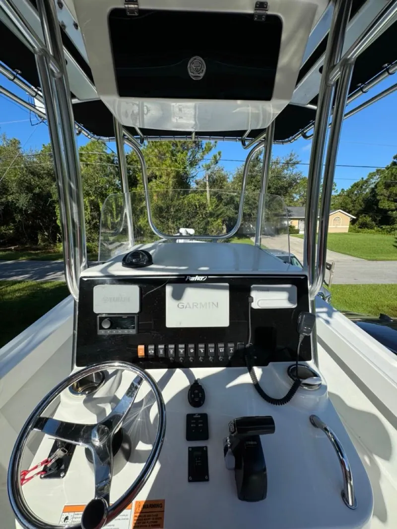 Slide: The Image of 2022 Parker 2300 Special Edition boat dashboard with Garmin navigation system. - 11