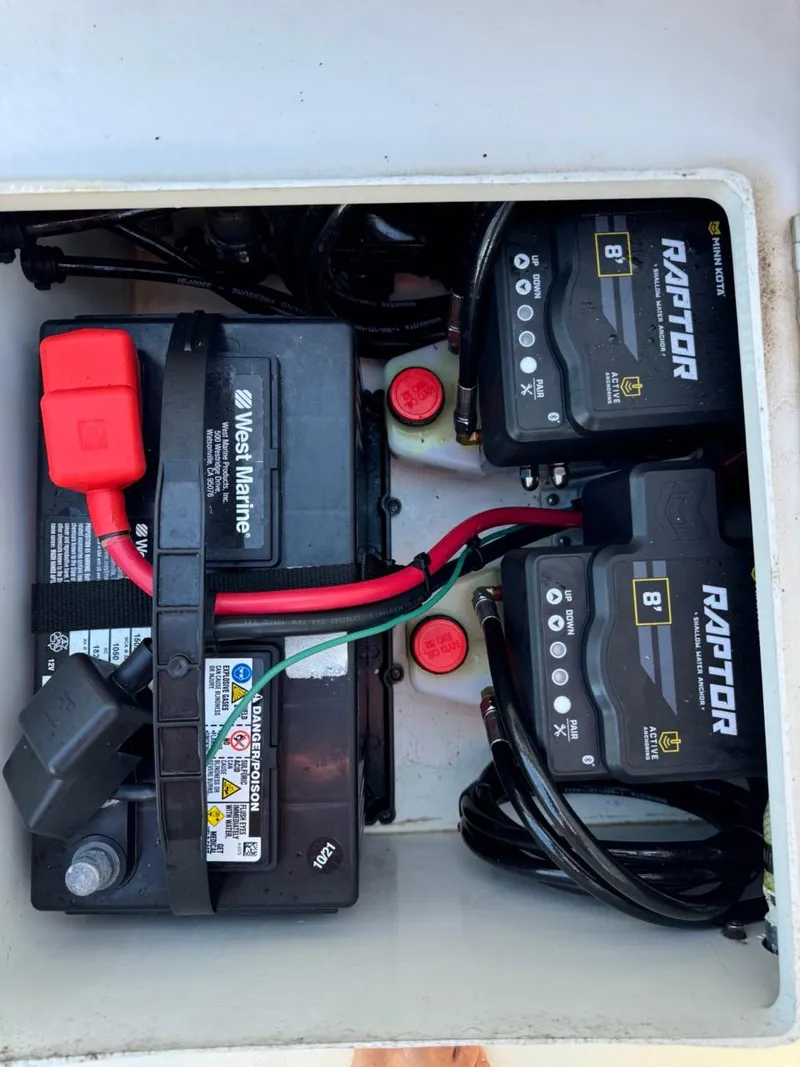 Slide: The Image of Battery compartment of 2022 Parker 2300 Special Edition with West Marine and Raptor batteries. - 14