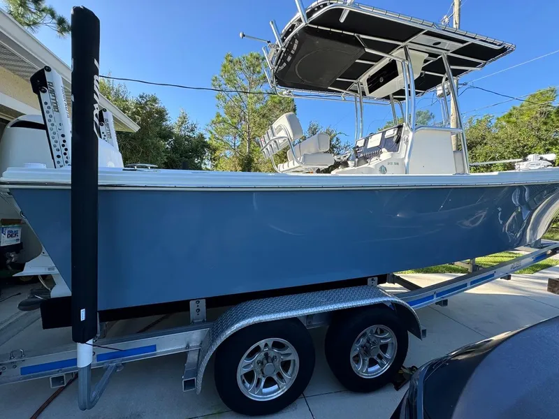 Slide: The Image of 2022 Parker 2300 Special Edition boat on trailer, side view, outdoors. - 3