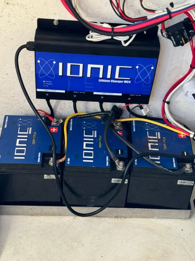 Slide: The Image of Ionic lithium charger and batteries setup in Parker 2300 Special Edition, 2022 model. - 8