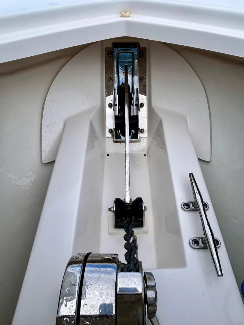 Slide: The Image of 2018 Pursuit S 368 Sport boat anchor system with chain and cleat. - 12