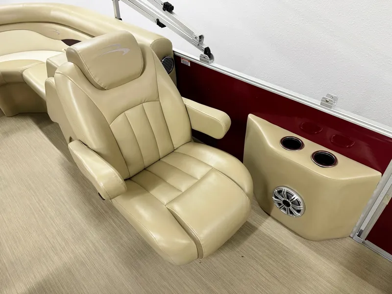 Slide: The Image of Luxurious seating on 2017 Bennington 21 SSRX pontoon boat with cup holders and speaker. - 11