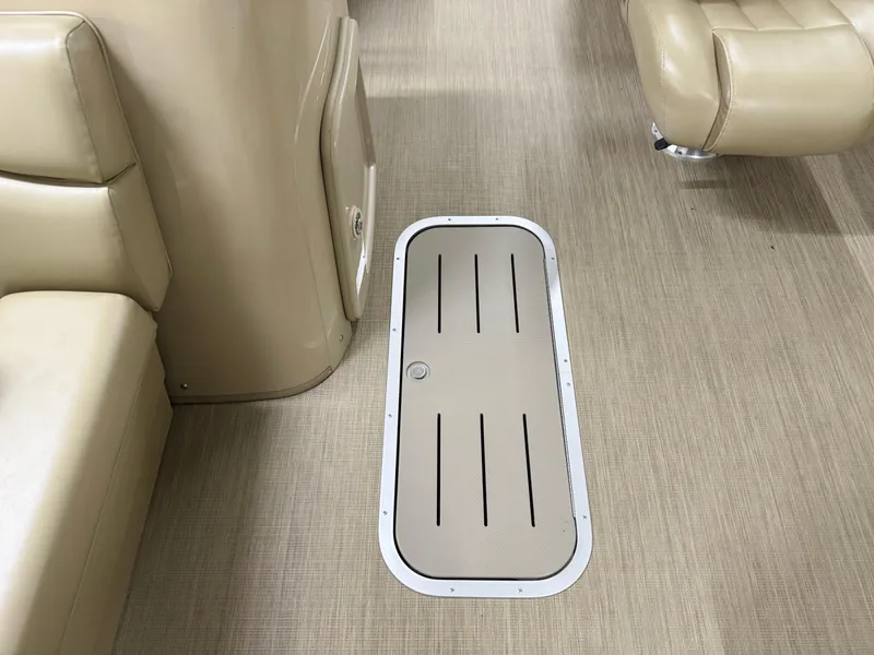 Slide: The Image of Interior of 2017 Bennington 21 SSRX boat with beige seating and flooring. - 12