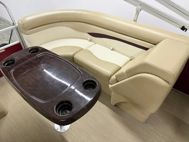 Slide: The Image of Luxurious seating and table on 2017 Bennington 21 SSRX pontoon boat. - 15