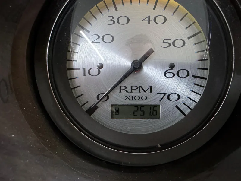 Slide: The Image of Close-up of a 2017 Bennington 21 SSRX RPM gauge displaying 2516 RPM. - 16