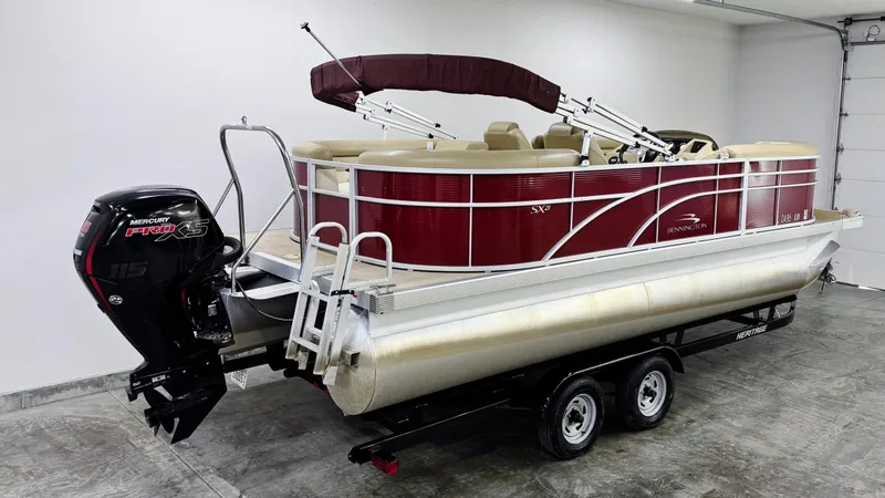 Slide: The Image of 2017 Bennington 21 SSRX pontoon boat with Mercury Pro XS 115 engine on trailer. - 3