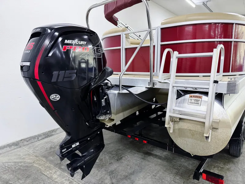 Slide: The Image of 2017 Bennington 21 SSRX pontoon boat with Mercury Pro XS 115 outboard motor. - 4