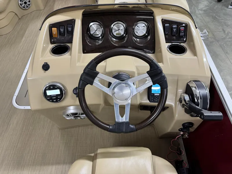 Slide: The Image of Steering console of 2017 Bennington 21 SSRX boat with gauges and controls. - 9