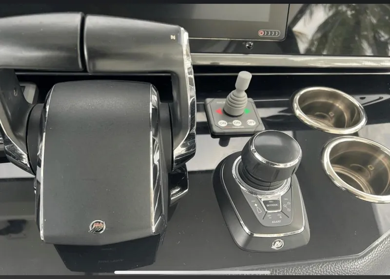 Slide: The Image of Cockpit of 2022 Azimut Verve 42 with dual Raymarine displays and modern controls. - 15