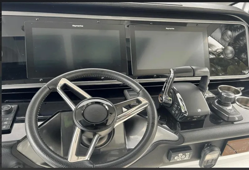 Slide: The Image of Control panel of 2022 Azimut Verve 42 yacht with throttle and joystick. - 16