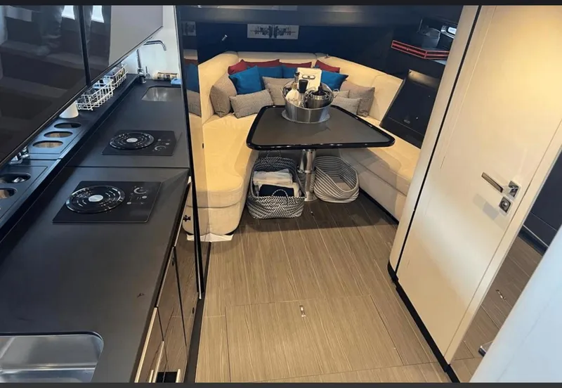 Slide: The Image of Helm of 2022 Azimut Verve 42 yacht with dual Raymarine displays and steering wheel. - 17