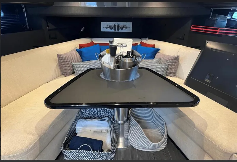 Slide: The Image of Luxurious interior of 2022 Azimut Verve 42 yacht with modern kitchen and cozy seating area. - 18