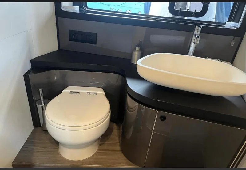 Slide: The Image of Bathroom interior of 2022 Azimut Verve 42 yacht with modern fixtures. - 24
