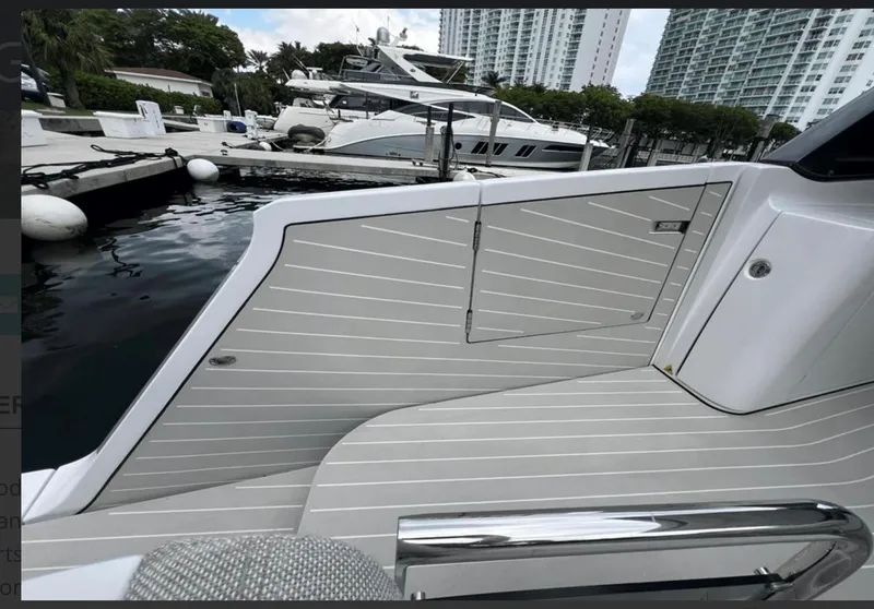 Slide: The Image of 2022 Azimut Verve 42 yacht docked, featuring sleek design and modern amenities. - 6
