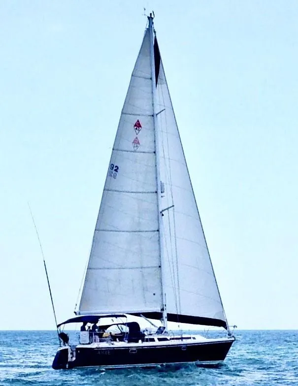 Slide: The Image of Sailing yacht Catalina 42 MK 1, 1992 model, cruising on open water. - 10