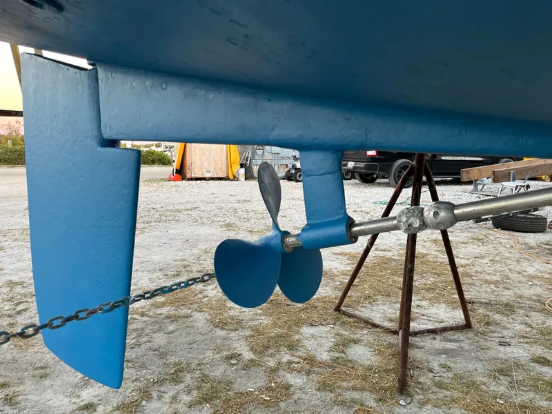 Slide: The Image of Close-up of a 1992 Catalina 42 MK 1 sailboat's blue propeller and rudder. - 26