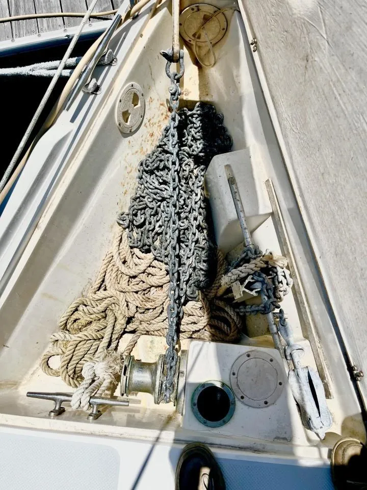 Slide: The Image of Anchor chain and ropes on a 1992 Catalina 42 MK 1 sailboat deck. - 5
