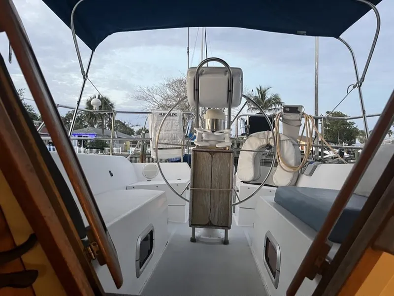 Slide: The Image of Cockpit view of 1992 Catalina 42 MK 1 sailboat with blue canopy. - 8