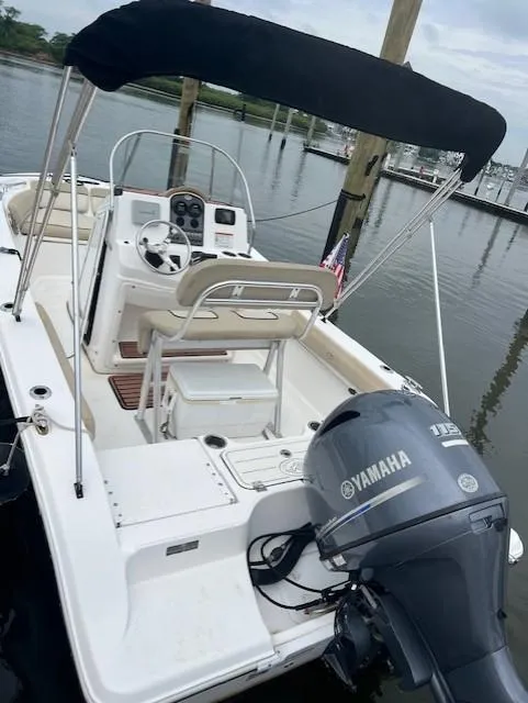 Slide: The Image of 2016 Sea Fox 186 Commander boat with Yamaha engine, docked at marina. - 14