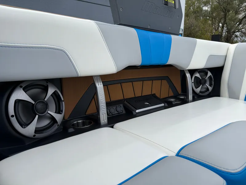 Slide: The Image of 2020 Malibu Wakesetter 23 MXZ interior with speakers and stylish seating. - 21