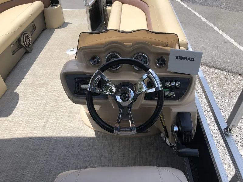 Slide: The Image of Steering console of 2019 Avalon GS Cruise 23' boat with Simrad electronics. - 8