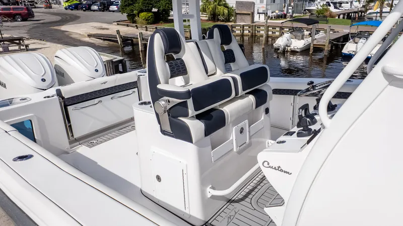 Slide: The Image of 2026 Tidewater 302CC boat interior with toilet and control panel. - 9