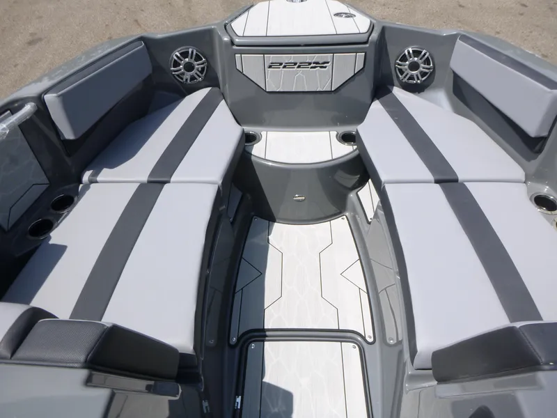 Slide: The Image of 2025 Yamaha Boats 222XD interior with gray seating and modern design. - 10